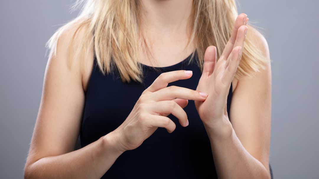 28290009-woman-using-sign-language.jpg