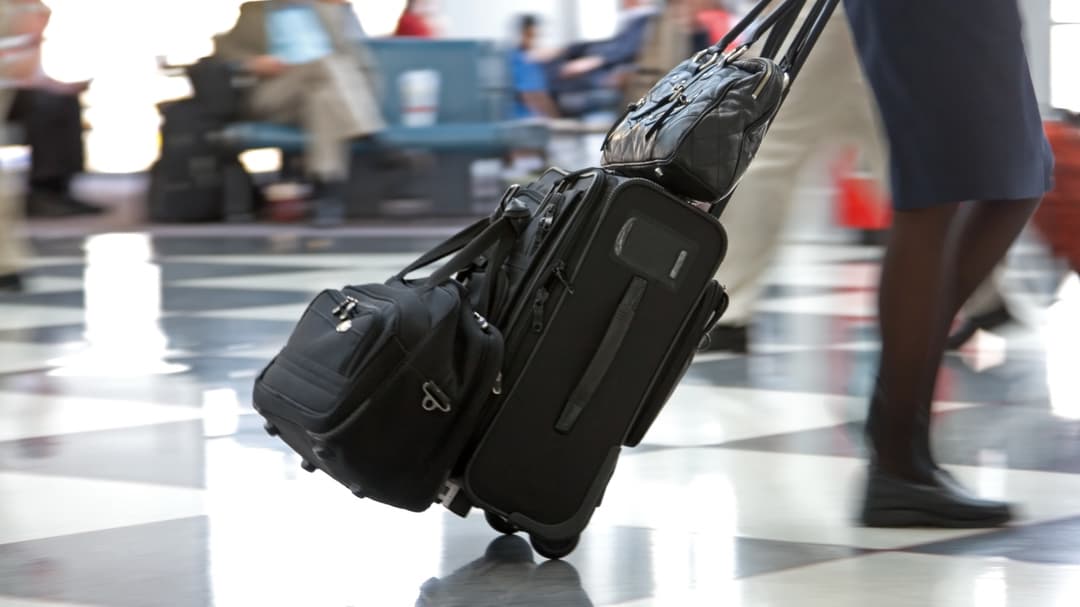 40920-airport-terminal-and-travellers-chad-mcdermott.jpg