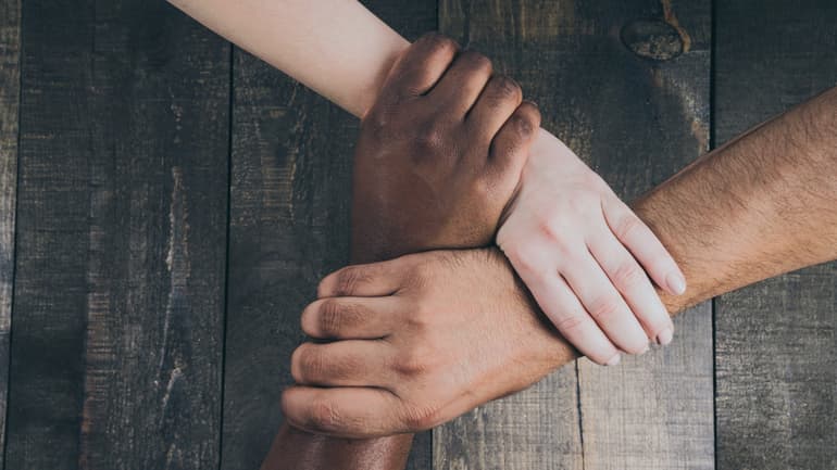 Team Hands Linked Together