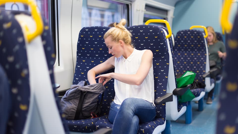 16431179-woman-travelling-by-train.jpg