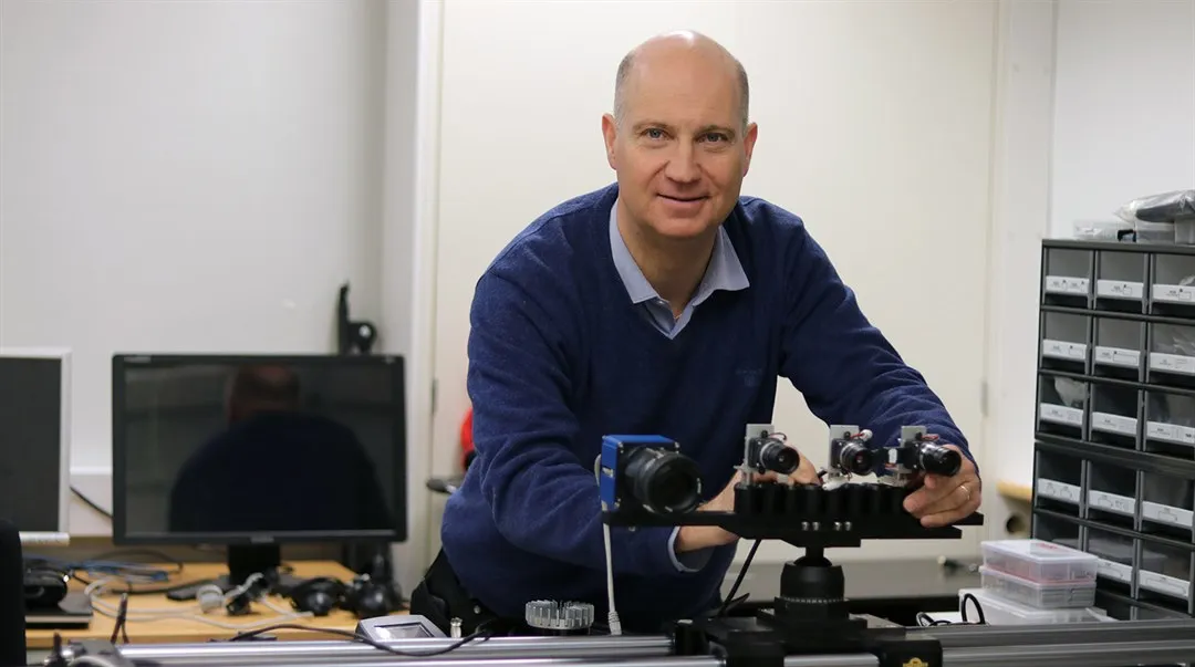 Mårten Sjöström working with a camera in the lab.