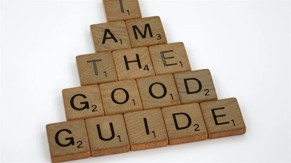  Wooden blocks in a pyramid shape, which says Iam the good guide