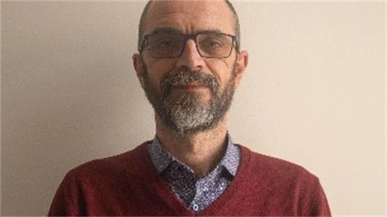 Porträtt av en man.