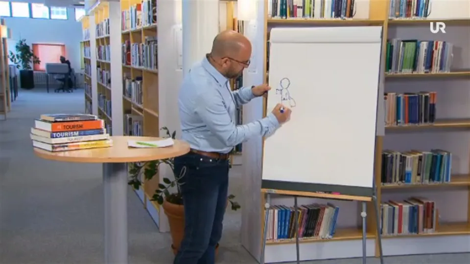 Robert Pettersson förläser om det turistiska systemet i UR