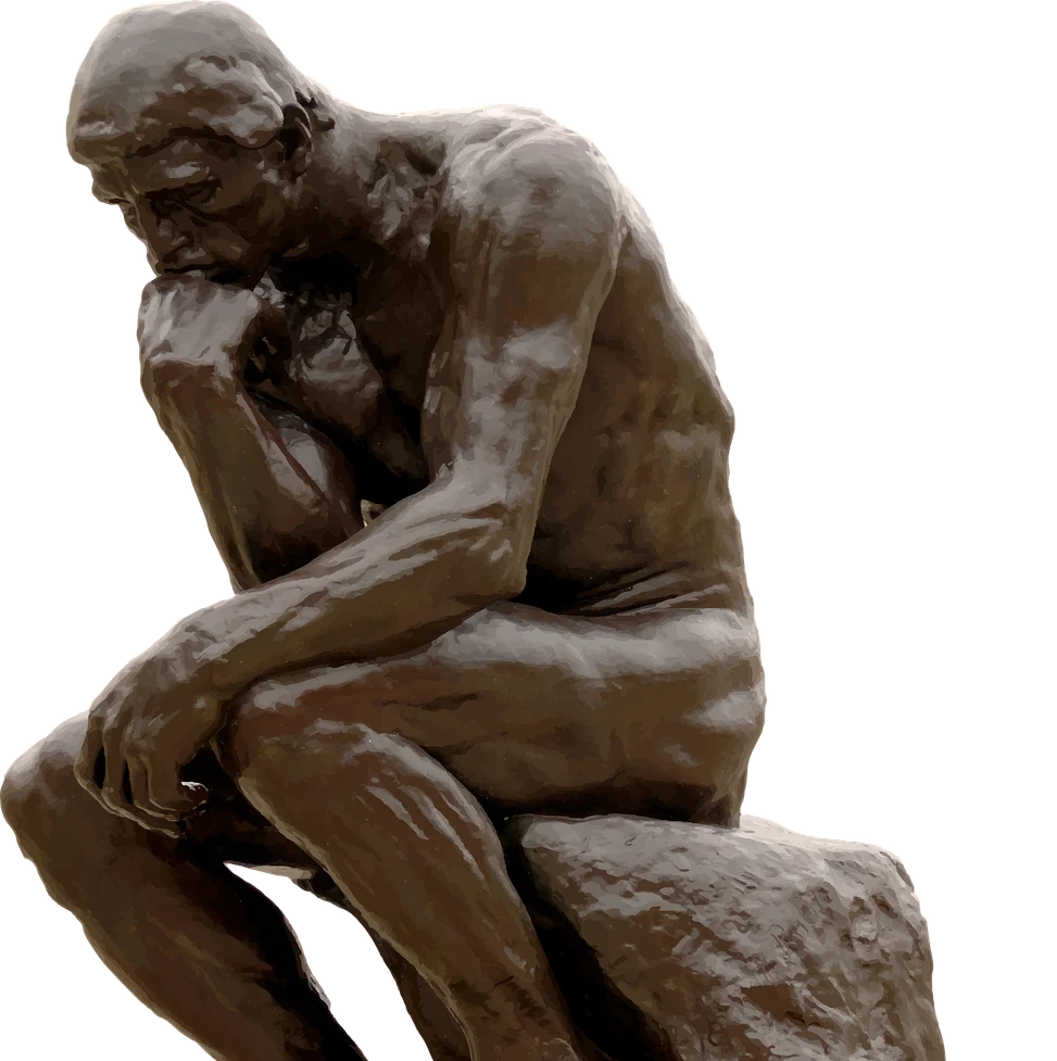 sculpture of man sitting down
