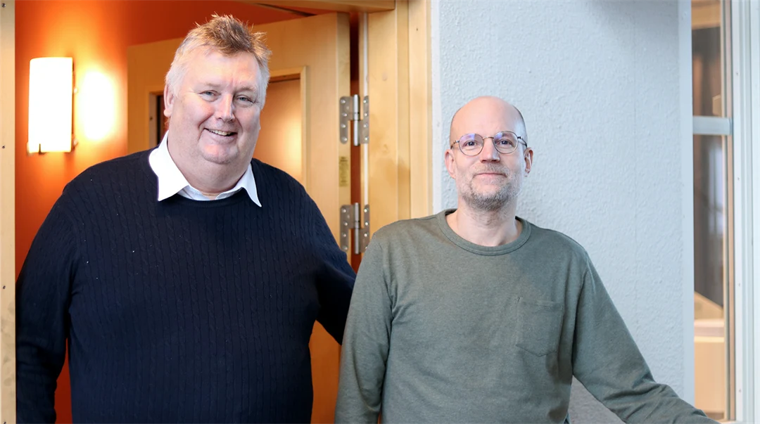 Porträttbild på två män. 