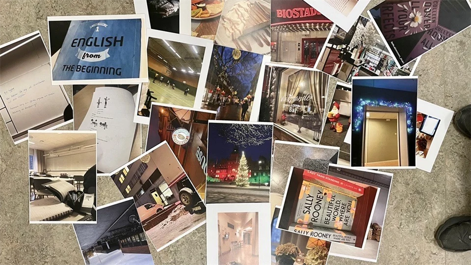 Printed photographs are scattered on a floor.