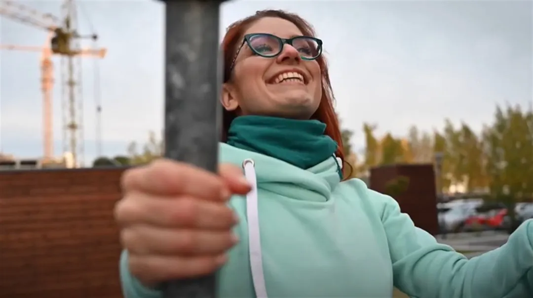 Happy woman exercising outdoors.