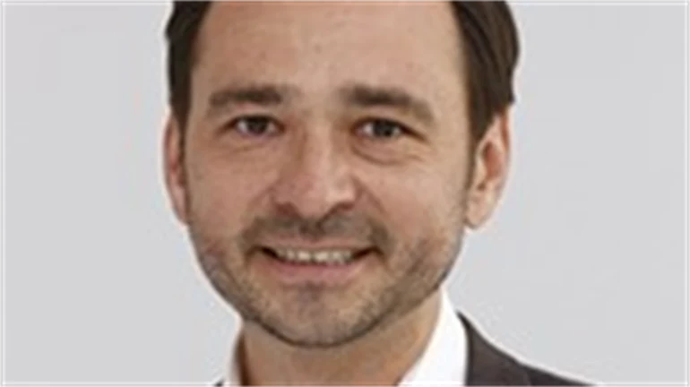 Porträtt av en man.