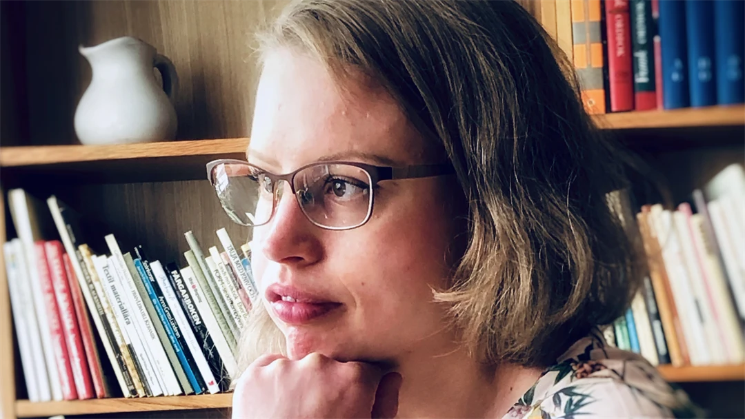 Porträtt av en kvinna.