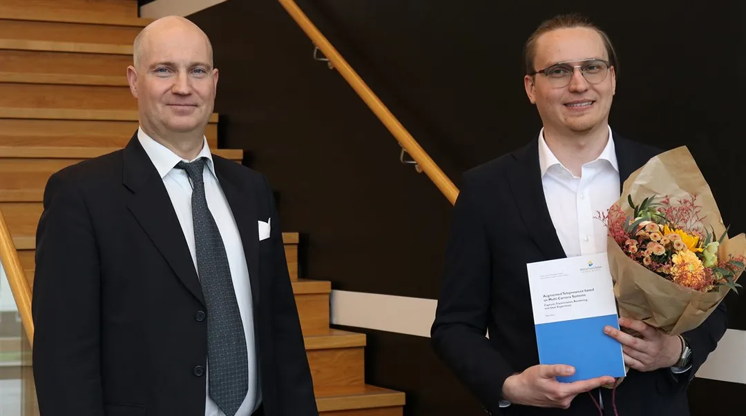 Professor Mårten Sjöström stands beside Dr. Elijs Dima