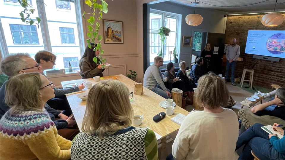 People listening to a seminar