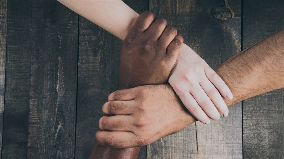 Team Hands Linked Together