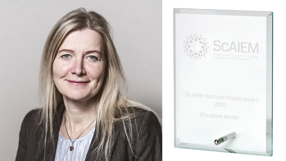 Christine Grosse och prisplaketten från ScAIEM