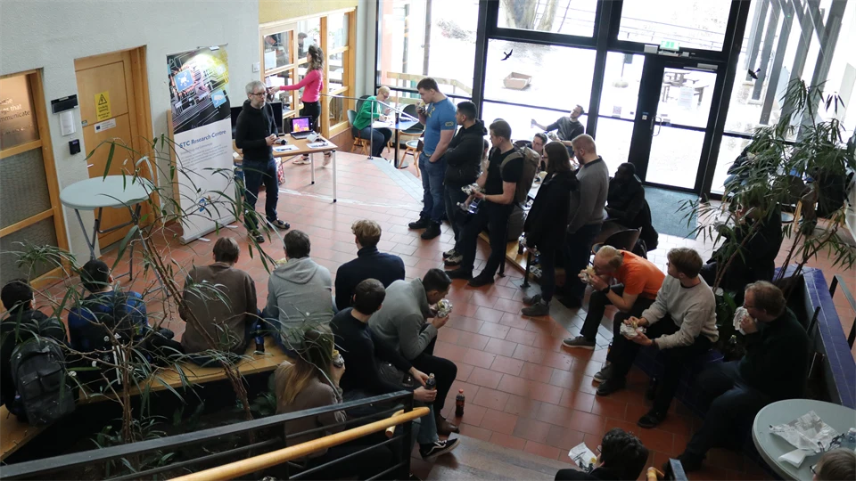 Students gathering and listens to a speaker
