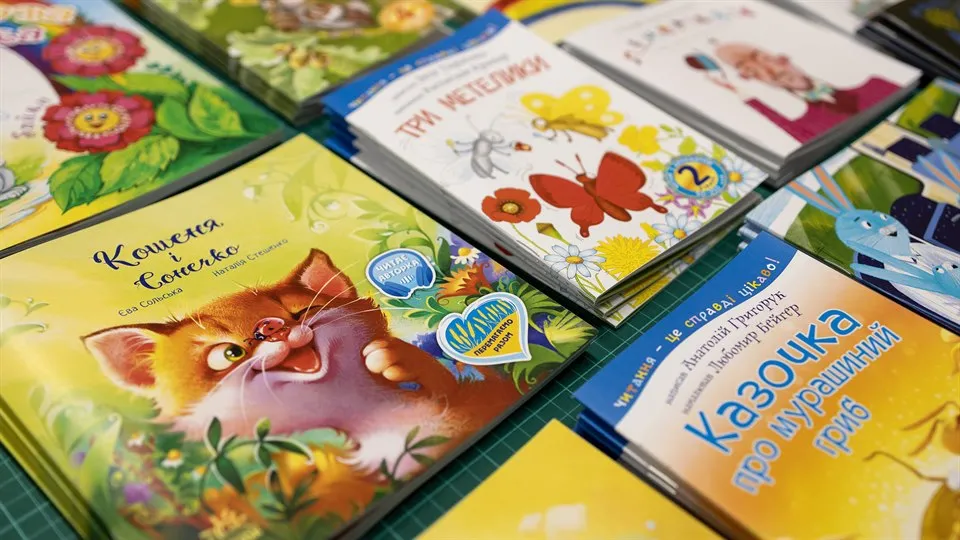 Several children's picture books in ukrainian  on a row